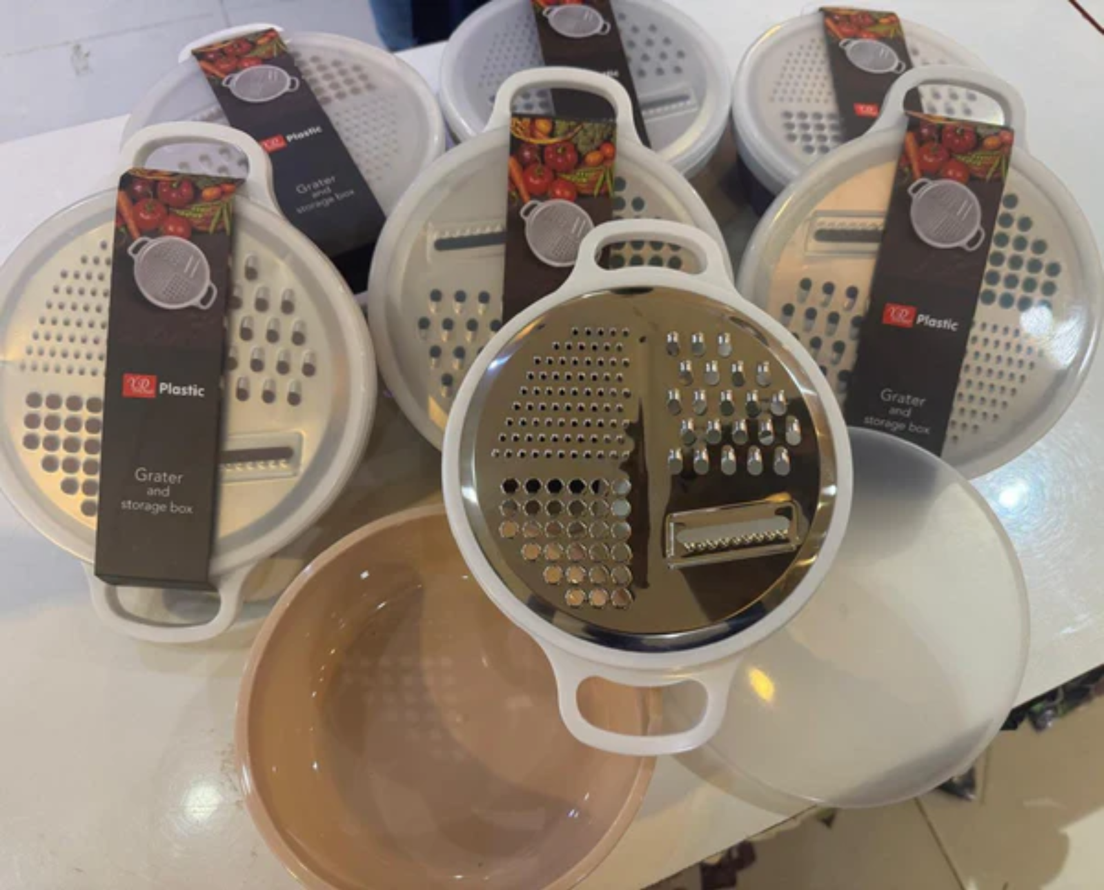 4-in-1 multi grater with case, cover, slicer, shredder kitchen tool